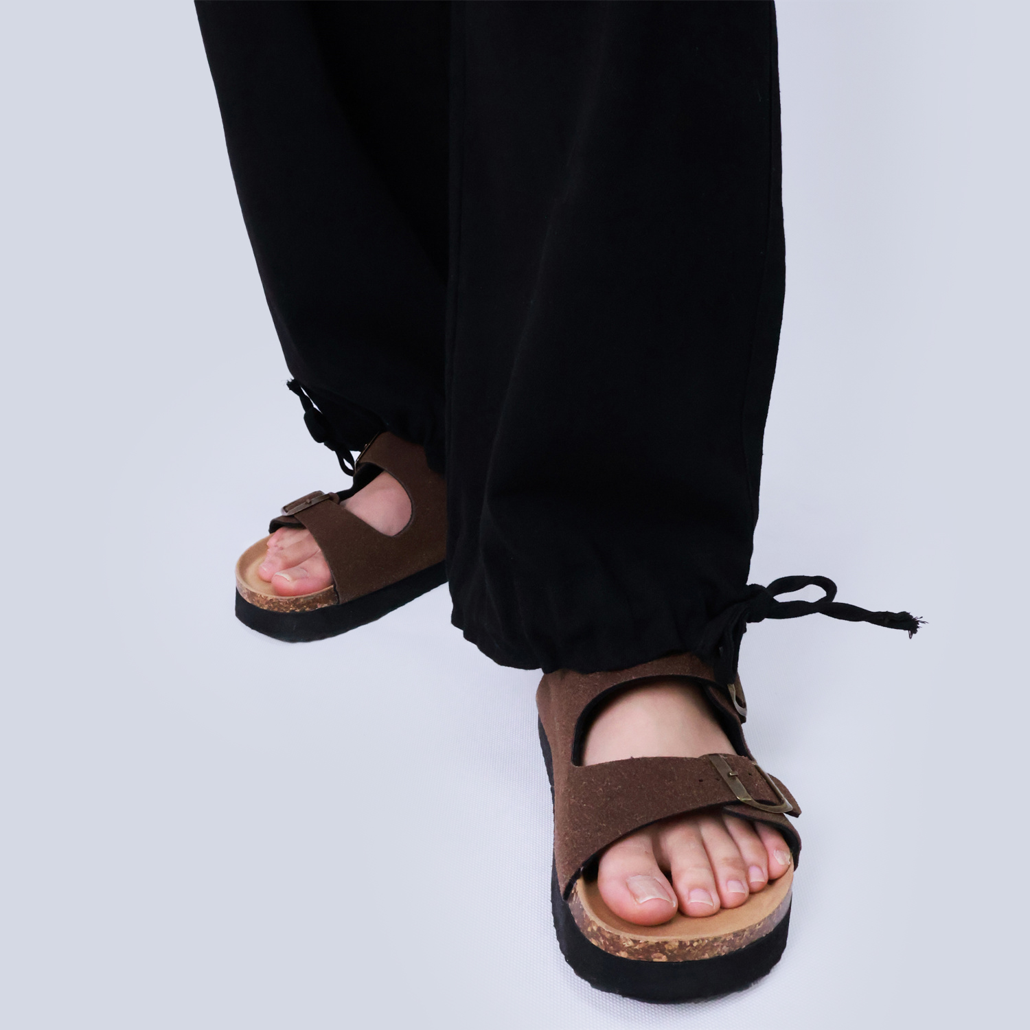 Pwest Stretchy mid-rise front pockets Comfortably loose ankle ties Lotus Tube Jeans