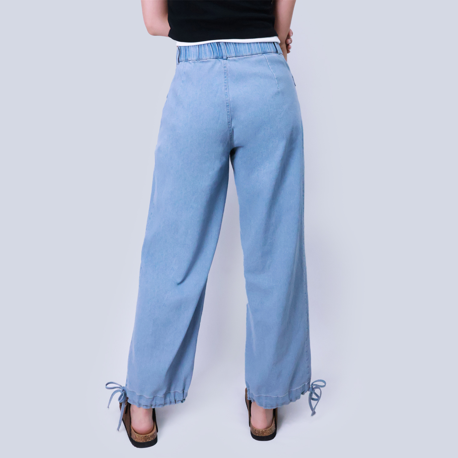 Pwest Stretchy mid-rise front pockets Comfortably loose ankle ties Lotus Tube Jeans