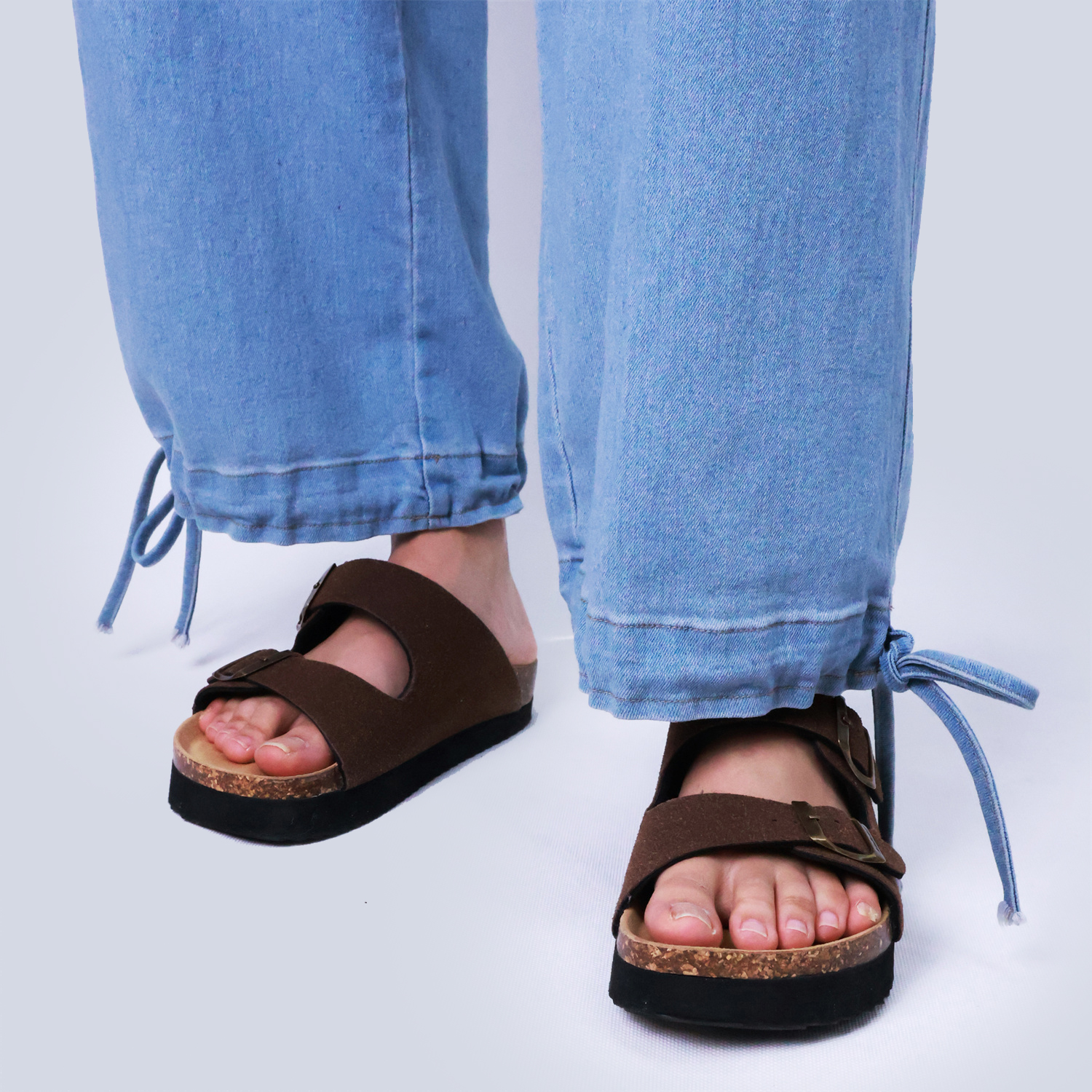 Pwest Stretchy mid-rise front pockets Comfortably loose ankle ties Lotus Tube Jeans