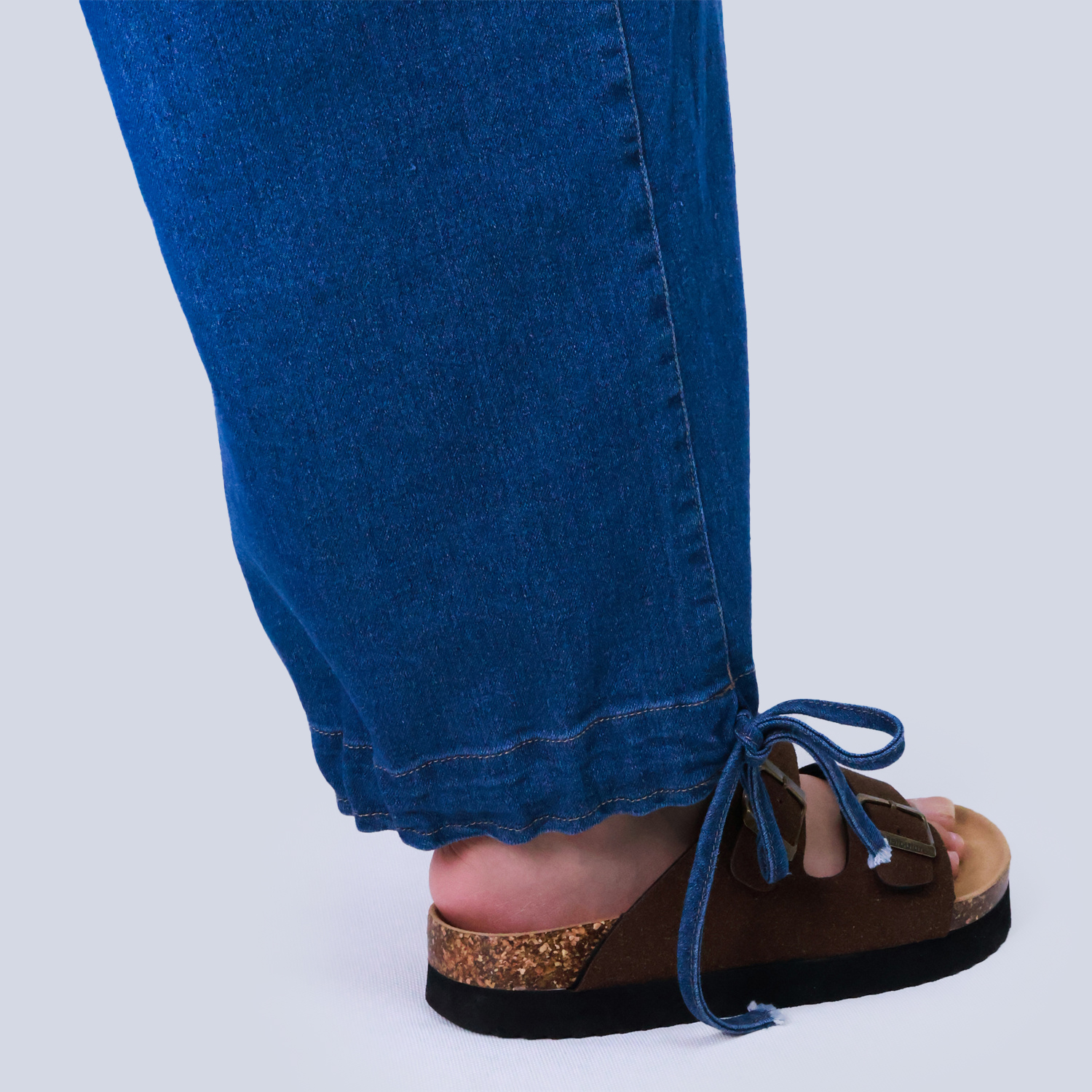 Pwest Stretchy mid-rise front pockets Comfortably loose ankle ties Lotus Tube Jeans