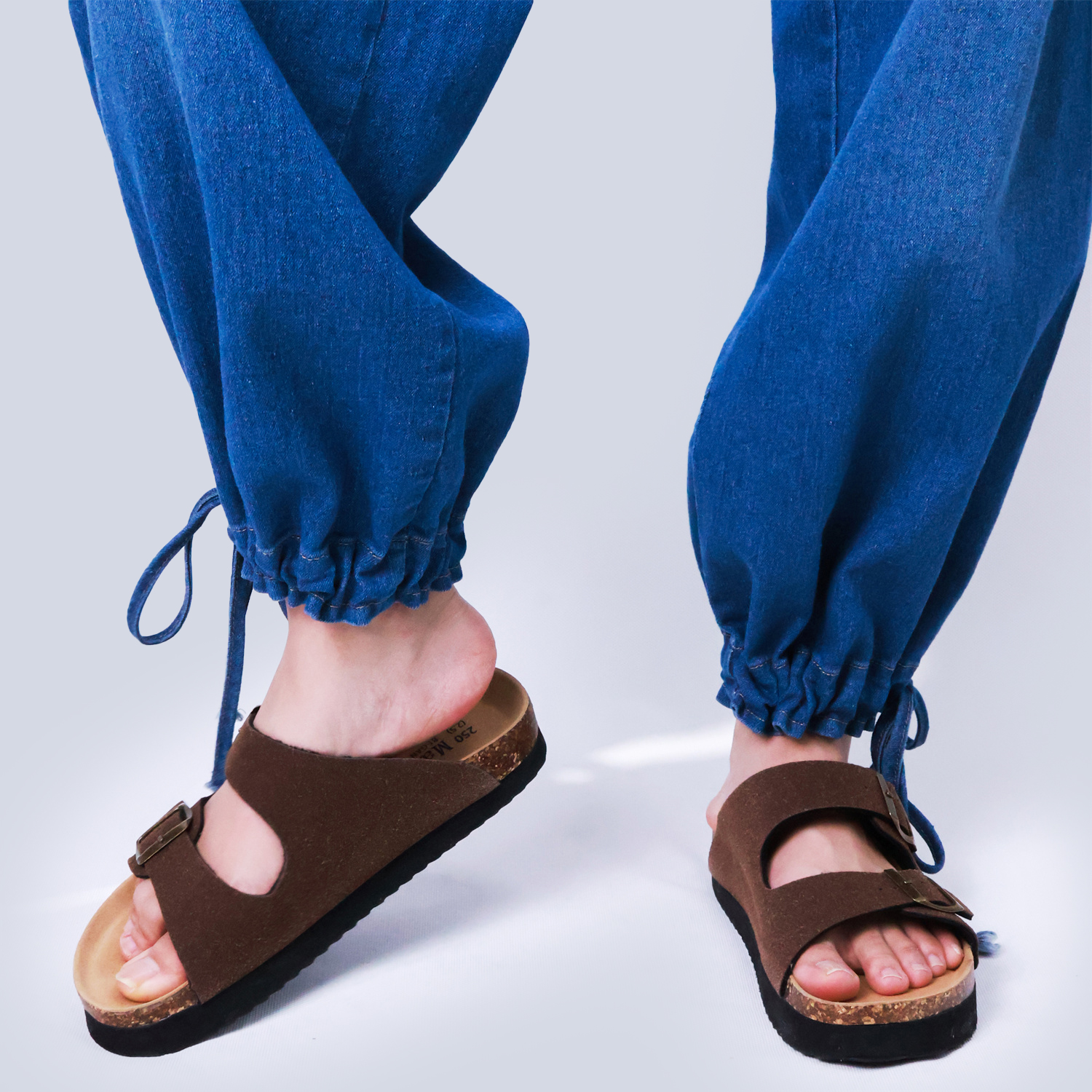 Pwest Stretchy mid-rise front pockets Comfortably loose ankle ties Lotus Tube Jeans