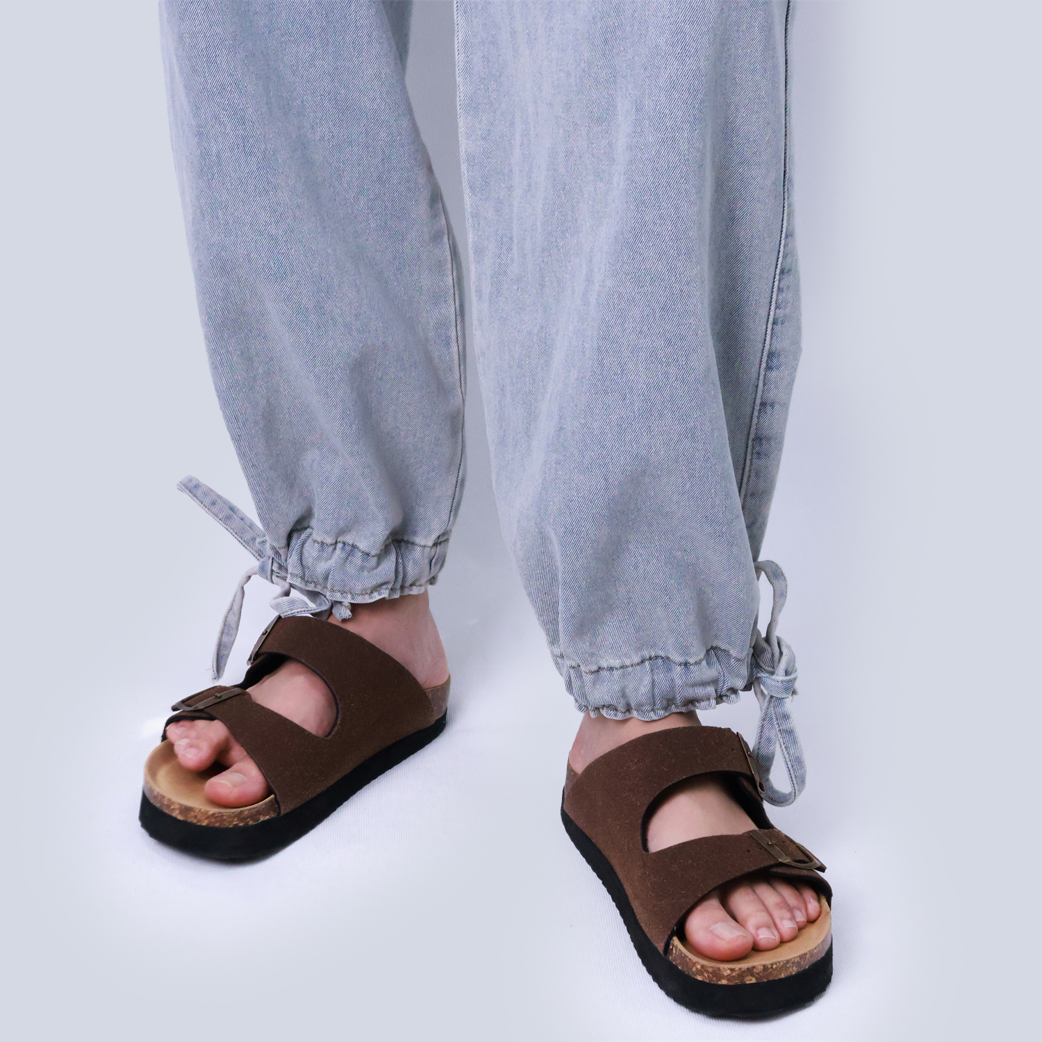 Pwest Stretchy mid-rise front pockets Comfortably loose ankle ties Lotus Tube Jeans