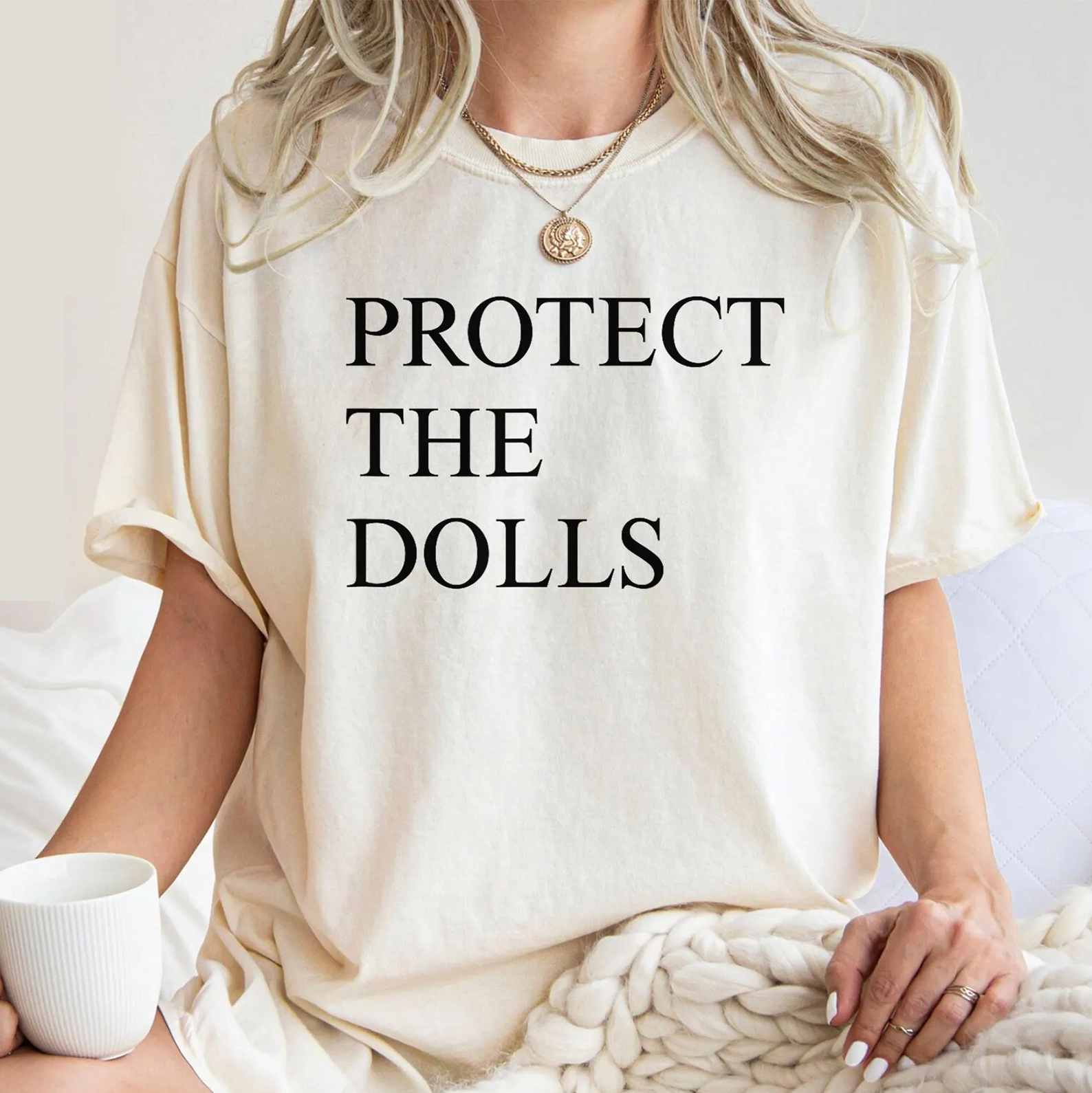 Protect The Dolls Unisex T-shirt