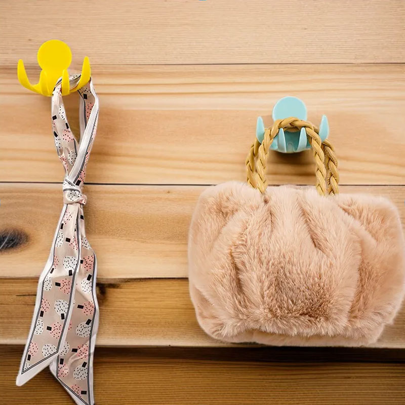 Multi functional hole free wall mounted plug with fixed hook