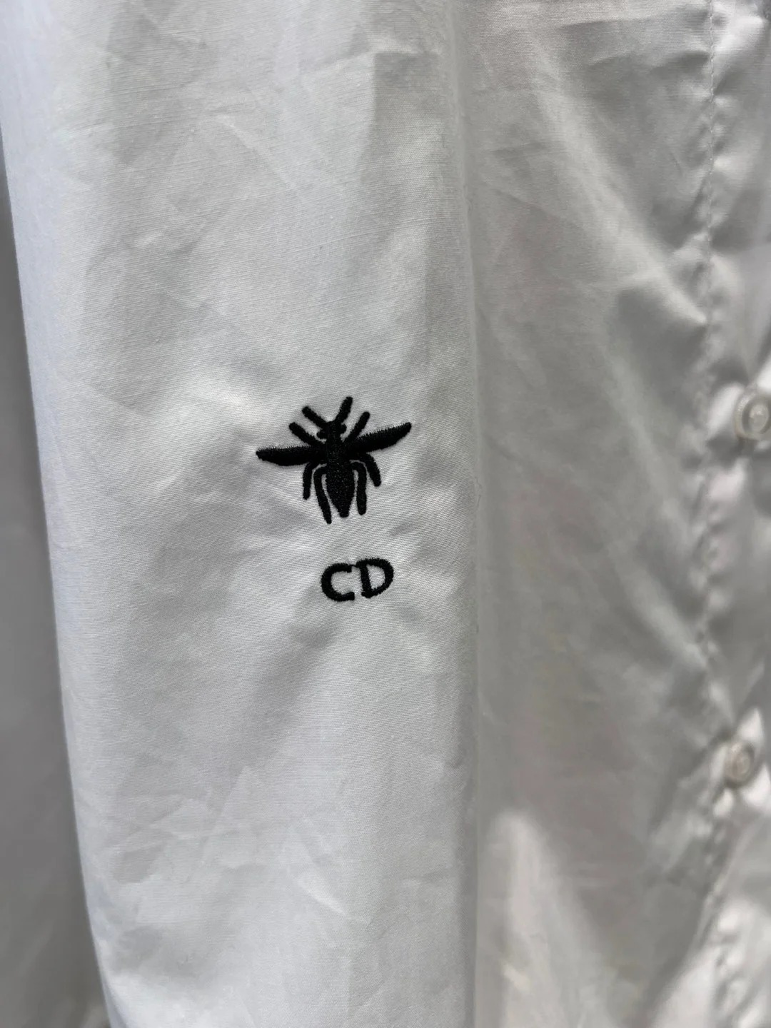 DIO25SS White One Shoulder Blouse