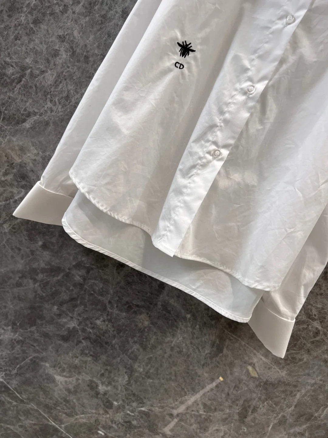 DIO25SS White One Shoulder Blouse