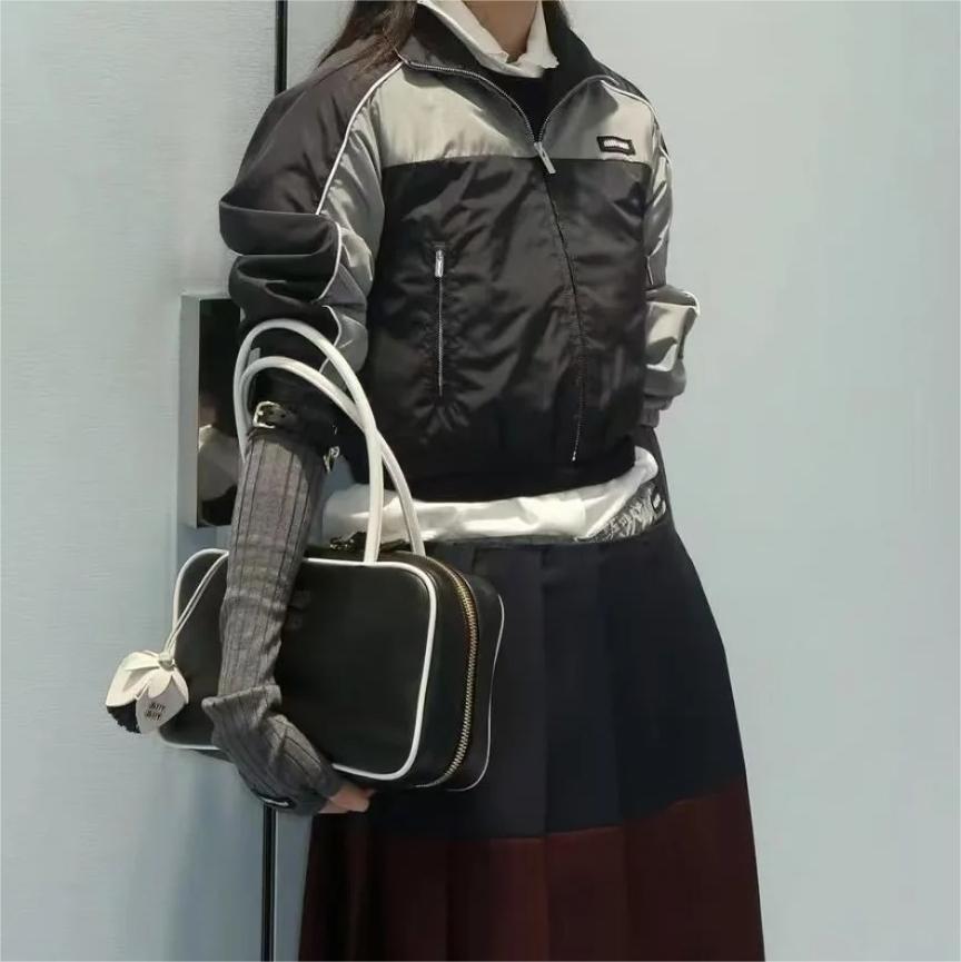 MIU25SS monogrammed appliquéd stand-up collar colorblocked short jacket