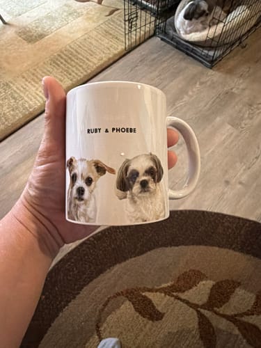 Pet owner displaying a personalized PAWEVERA gift