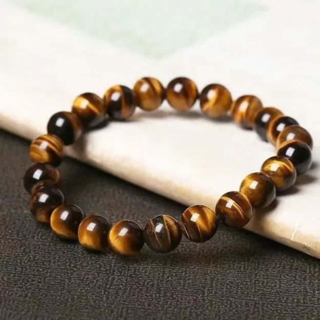 Unleash Power and Prosperity with NatureQi's Gold Tiger Eye Bracelet