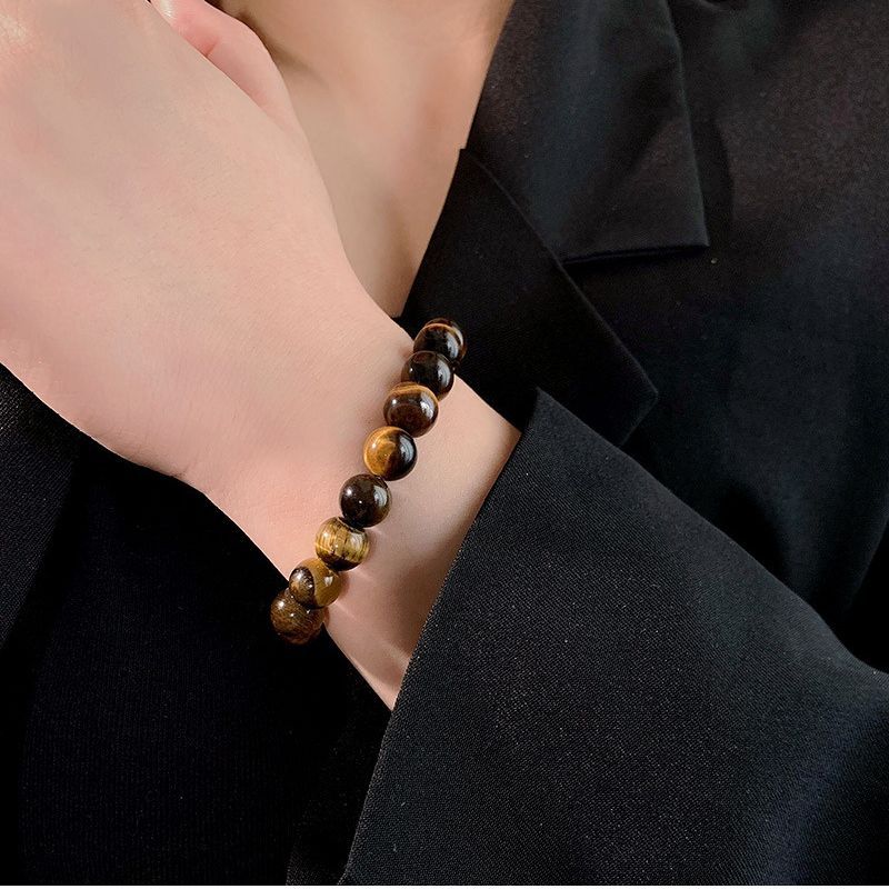 Unleash Power and Prosperity with NatureQi's Gold Tiger Eye Bracelet