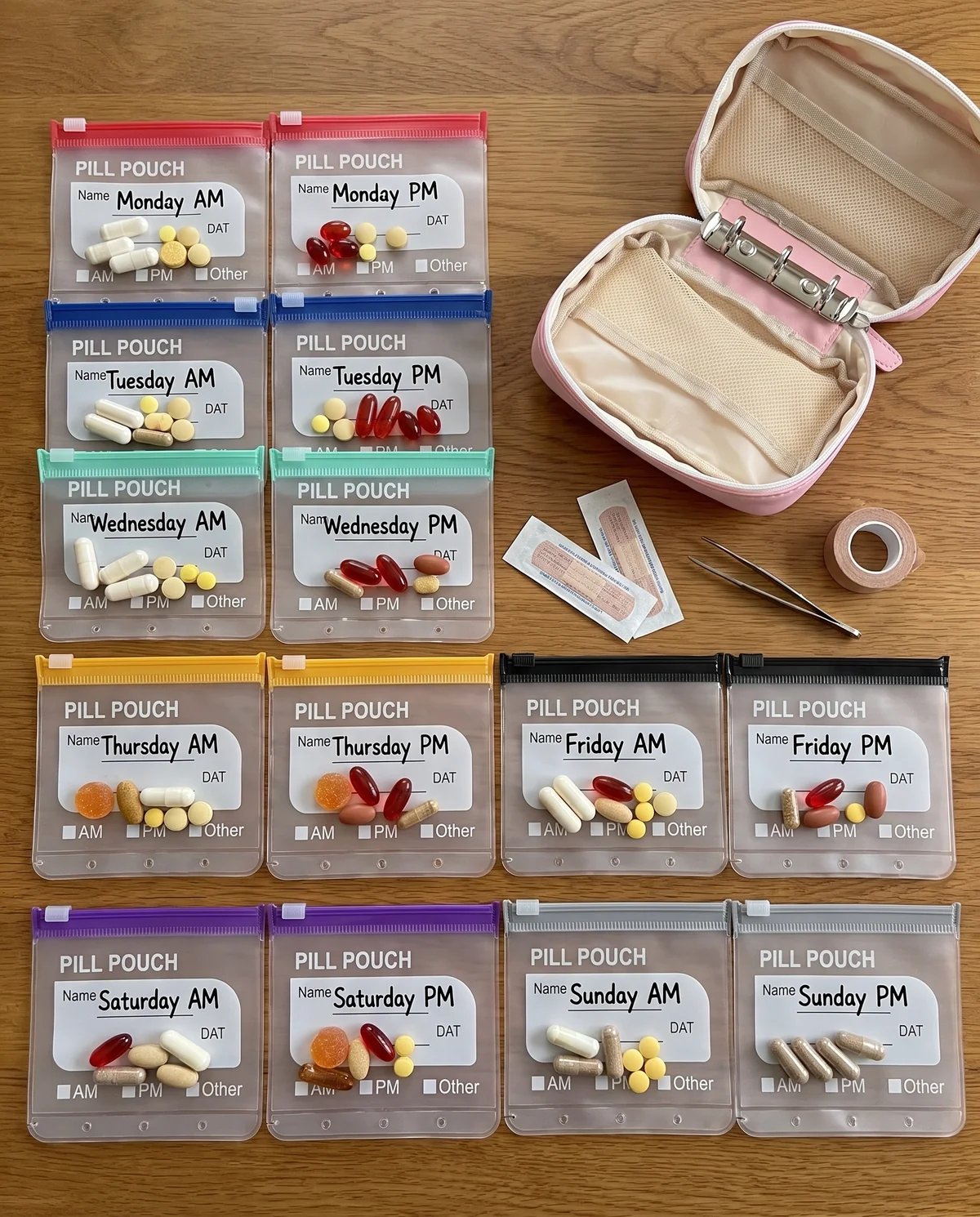Fourteen clear zip pill sleeves arranged inside the organizer