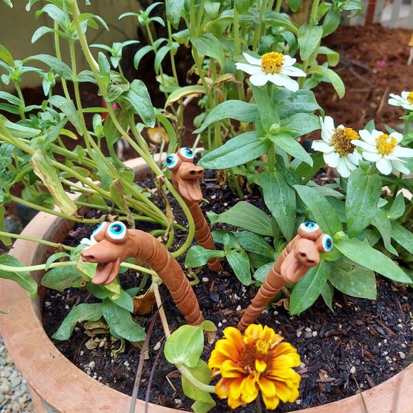 Three ceramic insect potted plant decorations as gifts