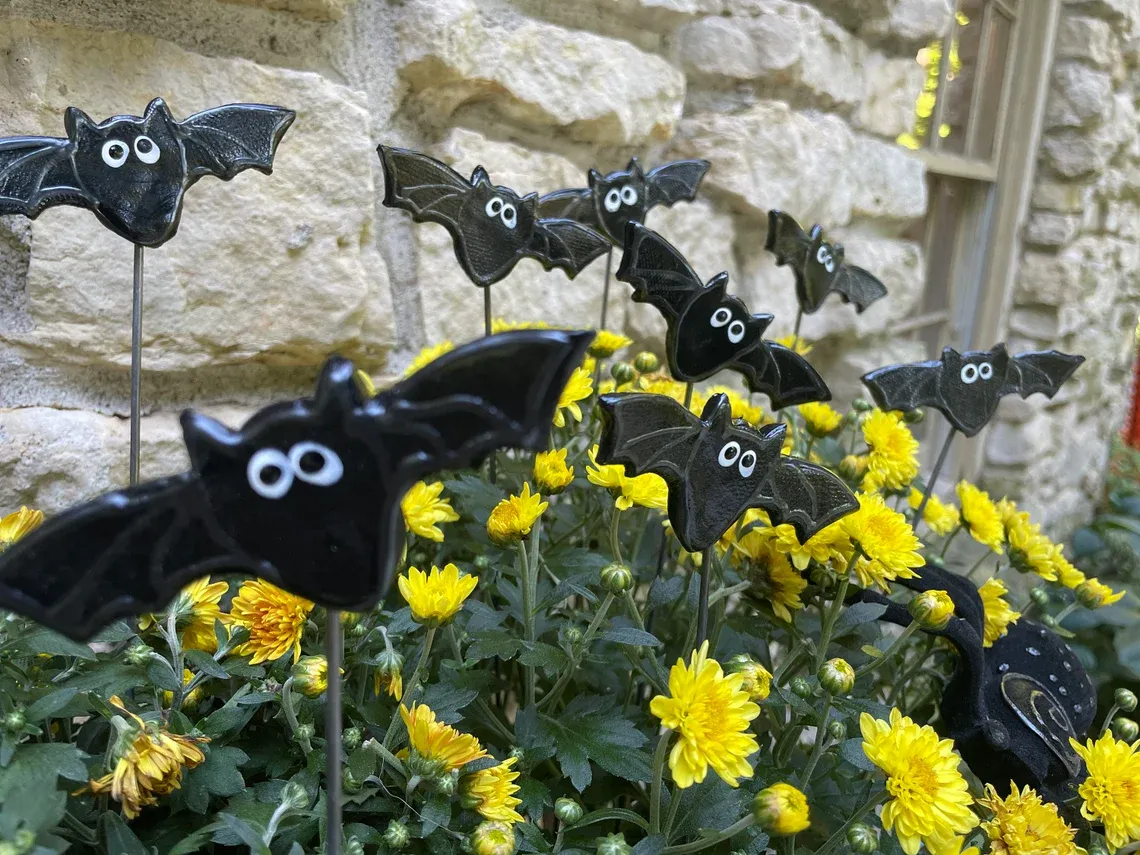 Halloween bat-themed potted plant decoration