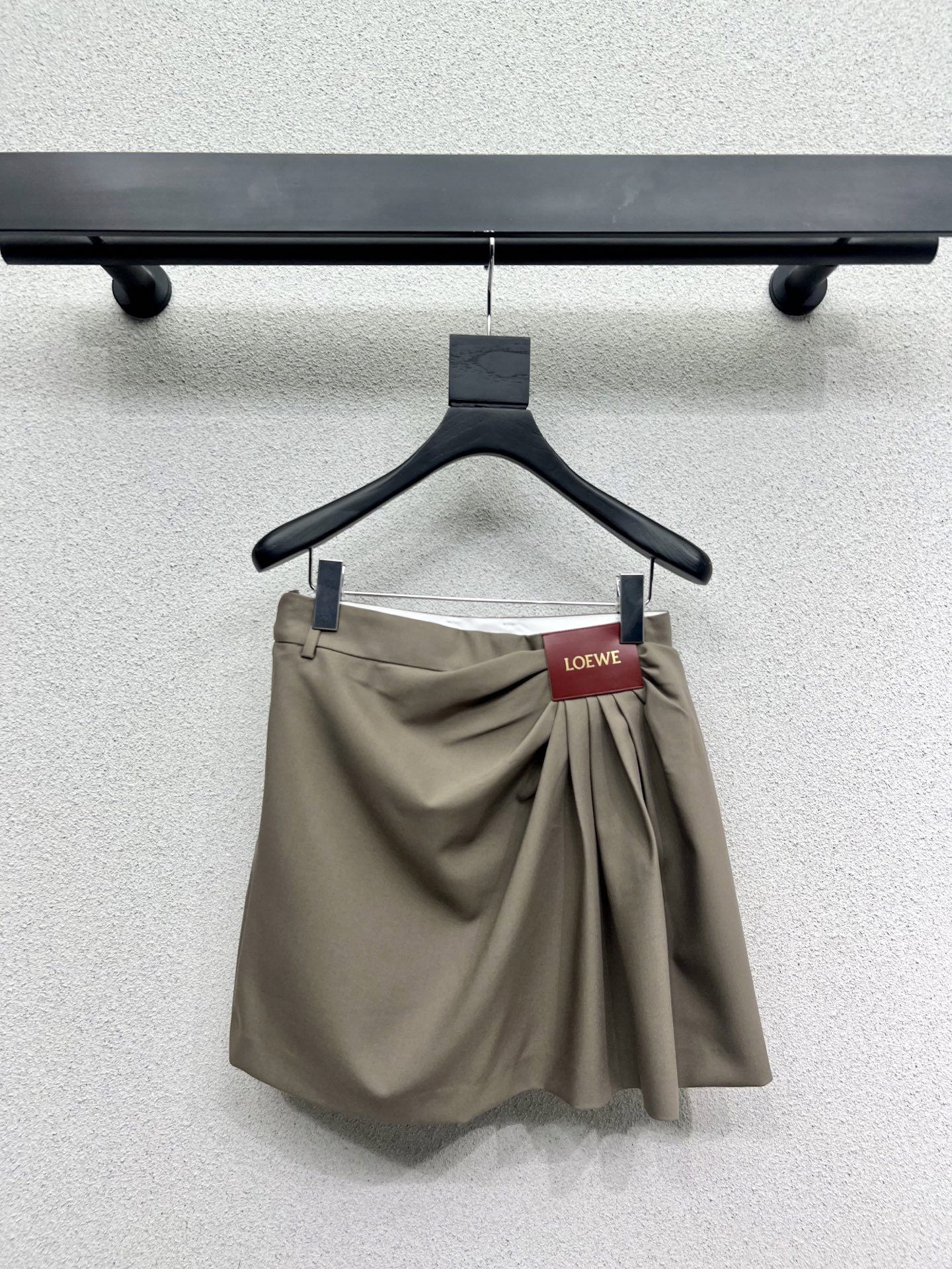 LOE25SS Leather Label Logo Half Skirt