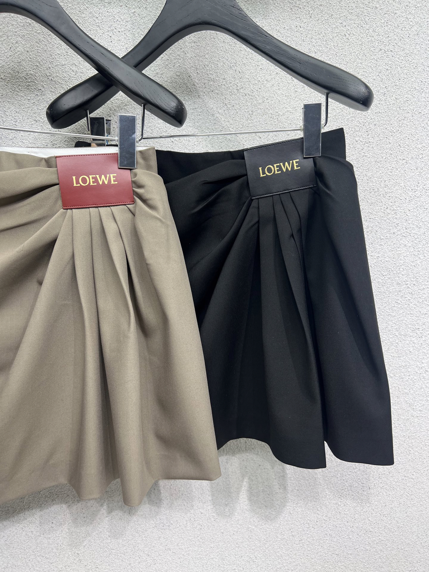 LOE25SS Leather Label Logo Half Skirt
