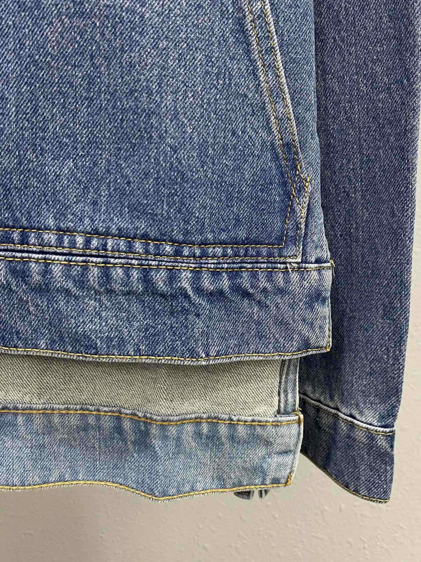 LOE25SS leather embossed logo denim jacket