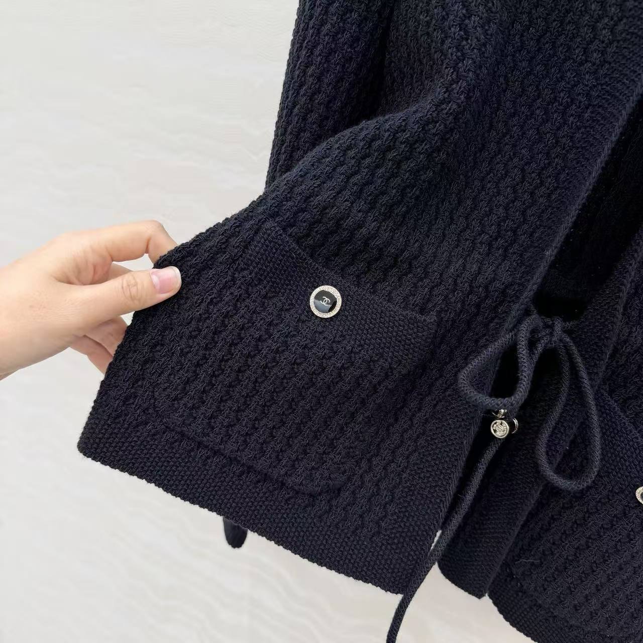 CC 26SS Rhinestone-button lace-up knitted cardigan