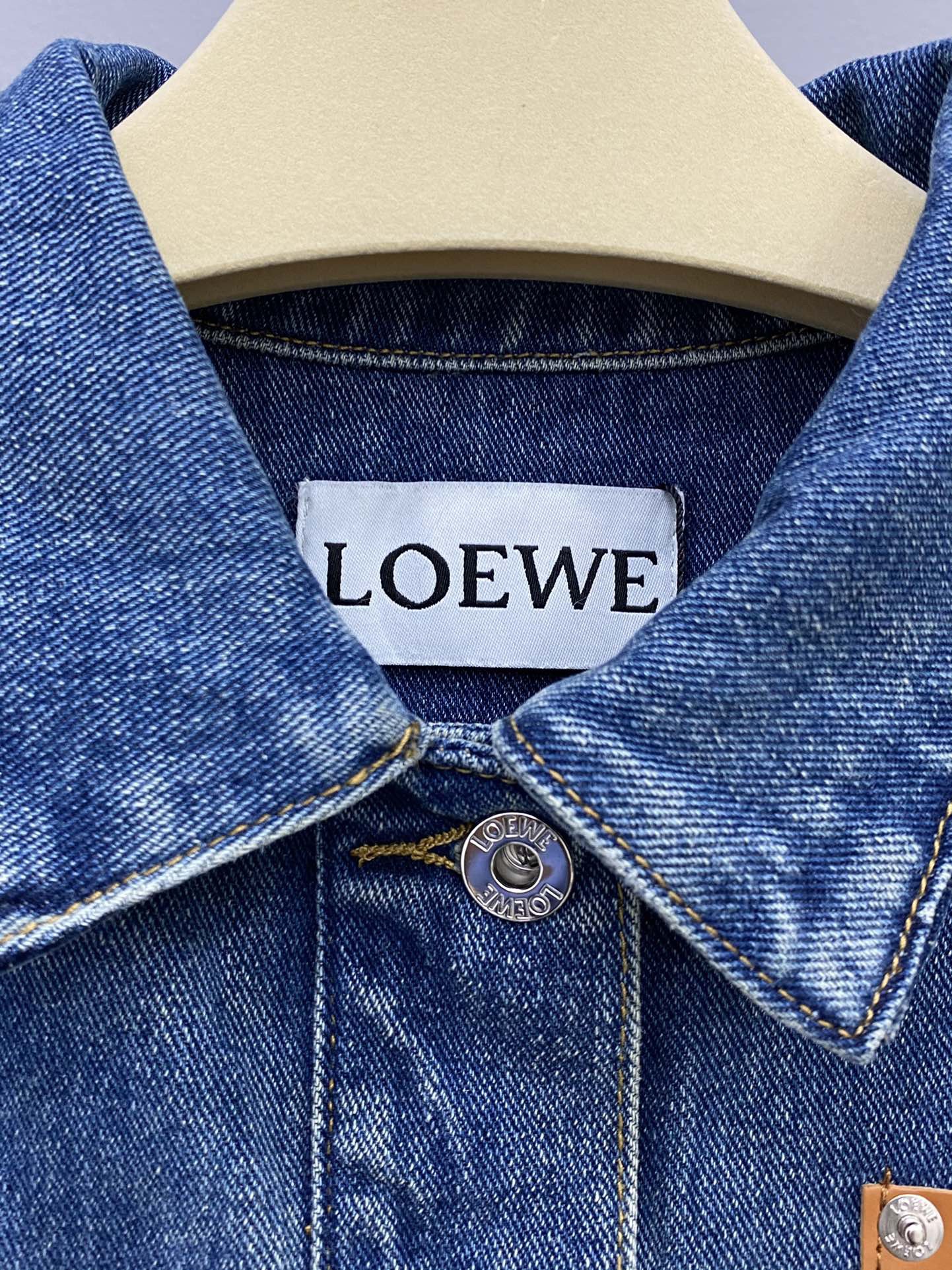 LEW Leather embossed logo denim jacket on the chest