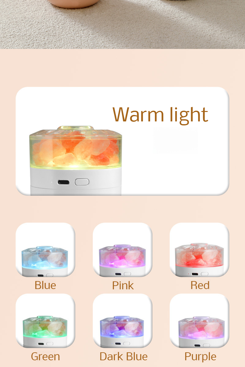 Mini salt lamp humidifier emitting colorful ambient light in car