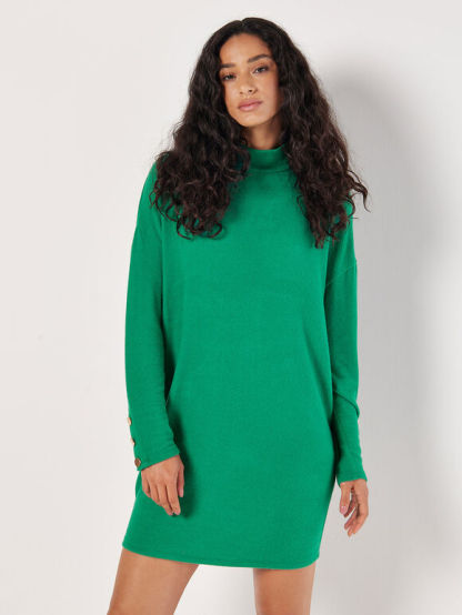 A soft green-textured, pod-shaped mini knitted dress