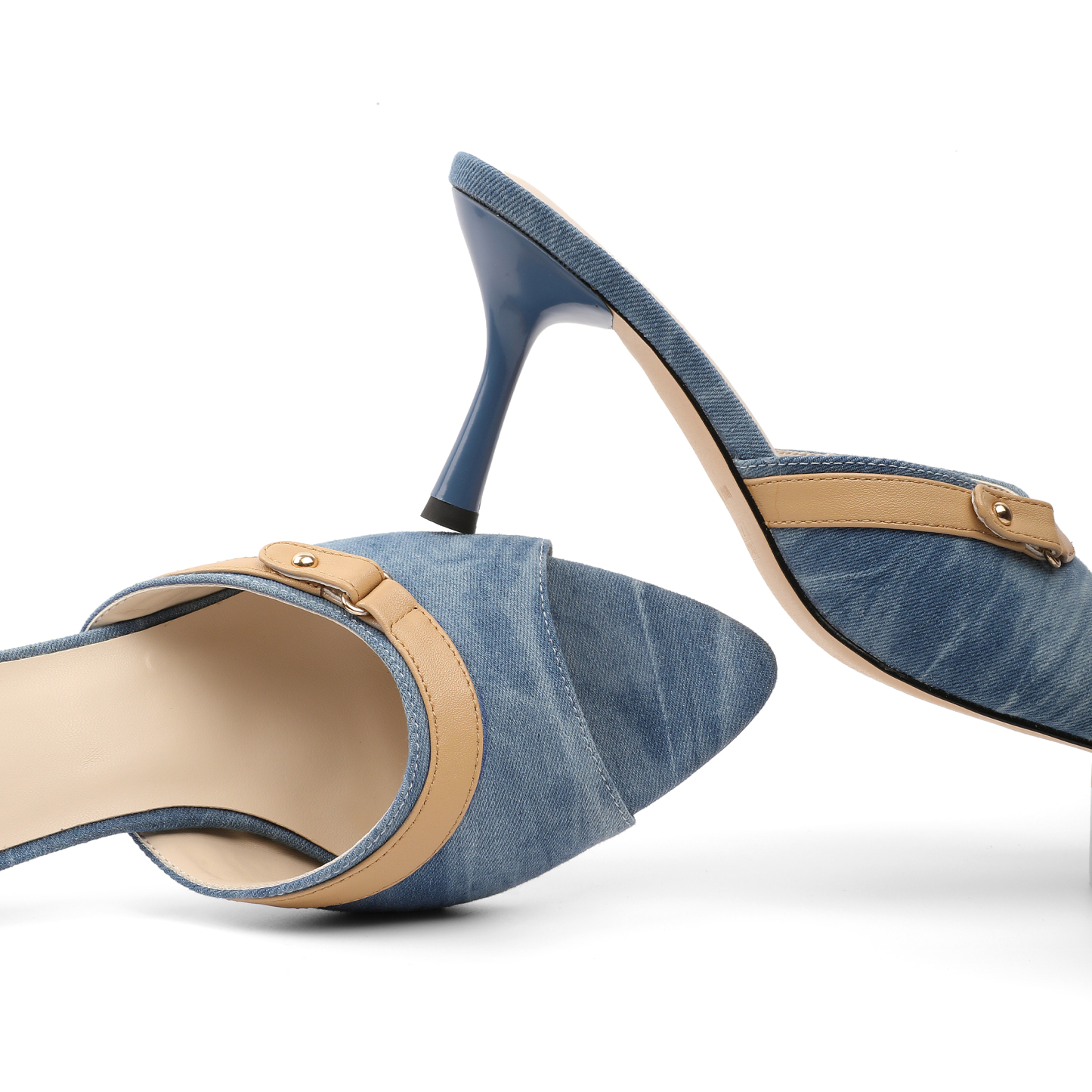 Top-down angle highlighting the pointed toe and clean mule structure