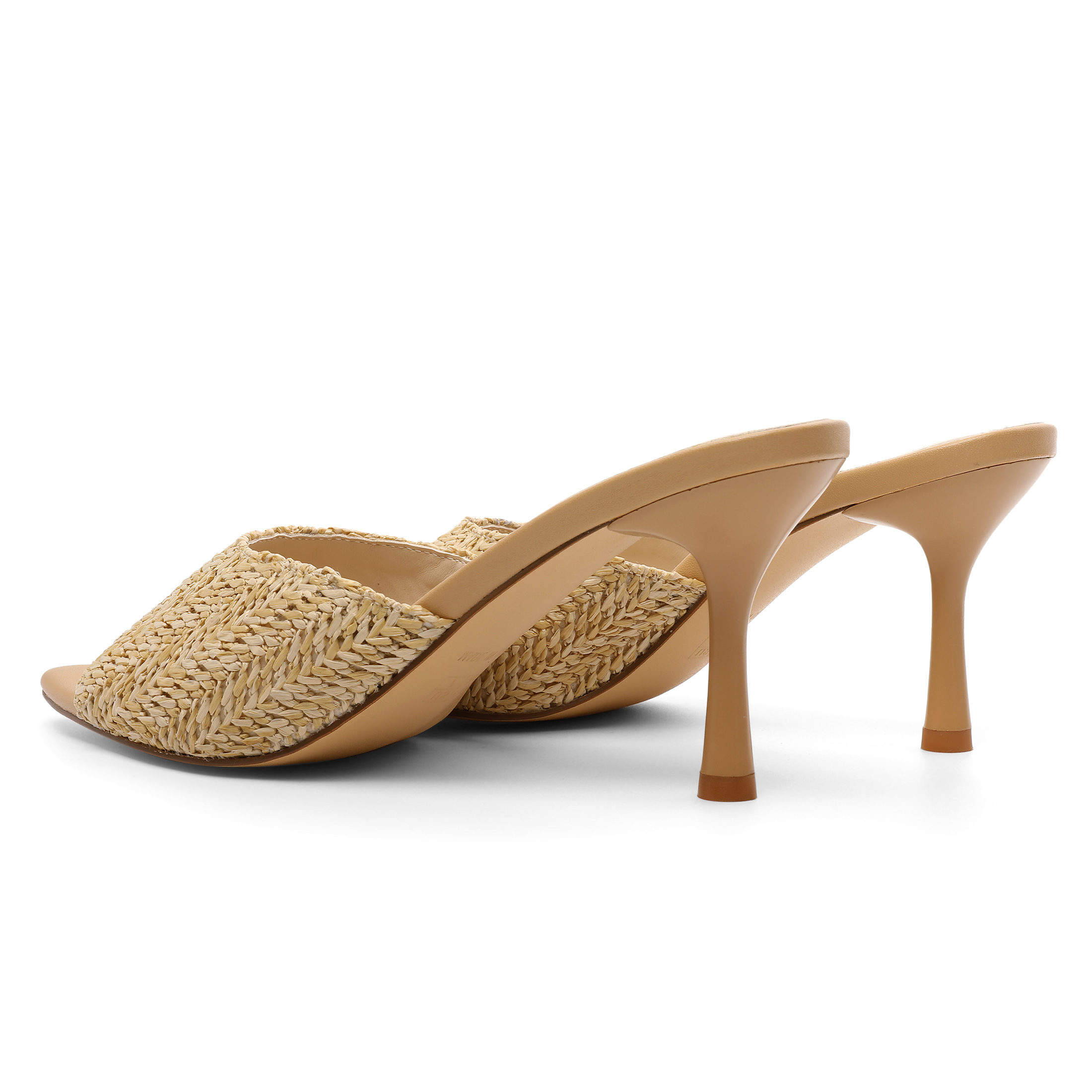 Rear angle highlighting the slim heel and clean slip-on structure