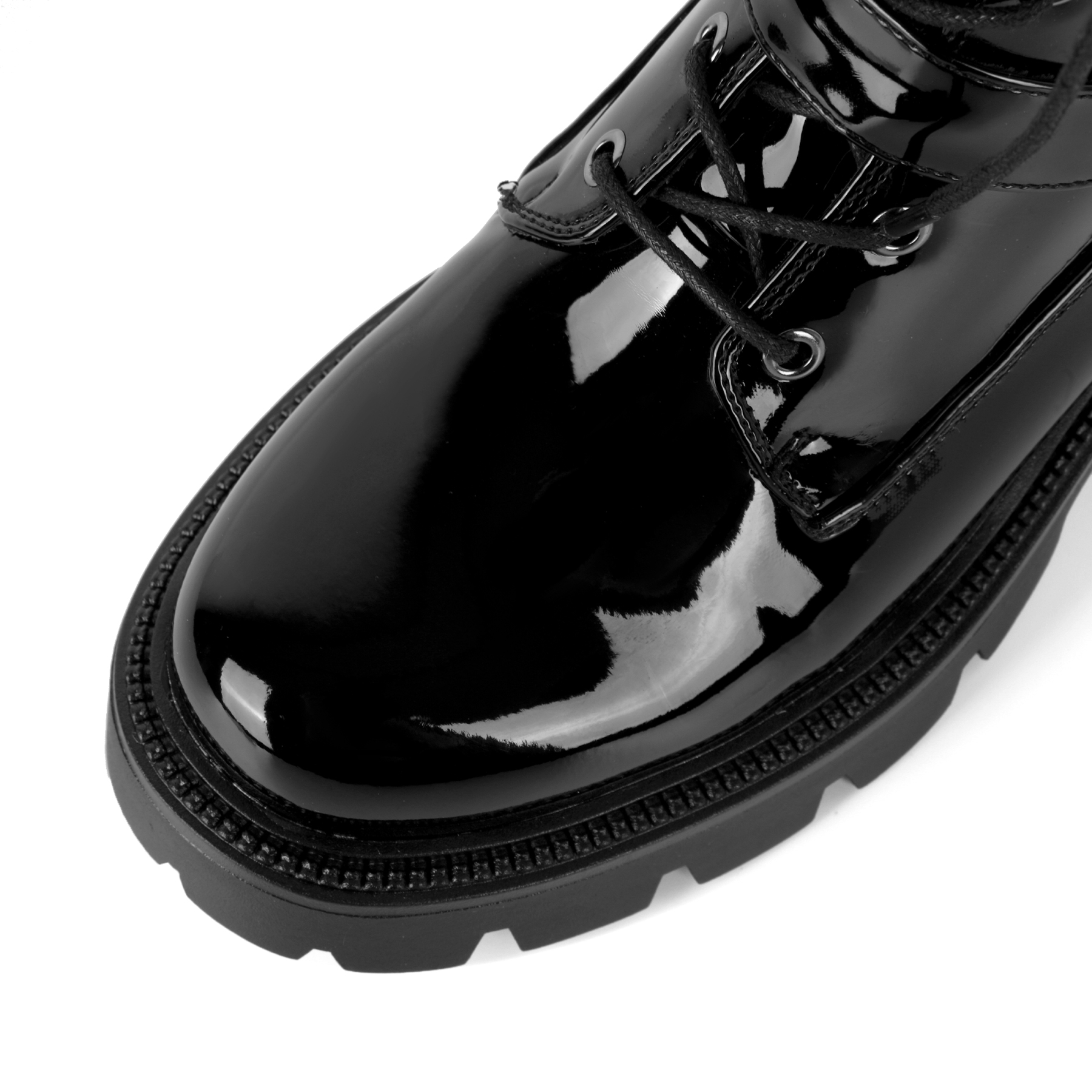 Close-up of round toe and lace-up front on Eldof combat boots