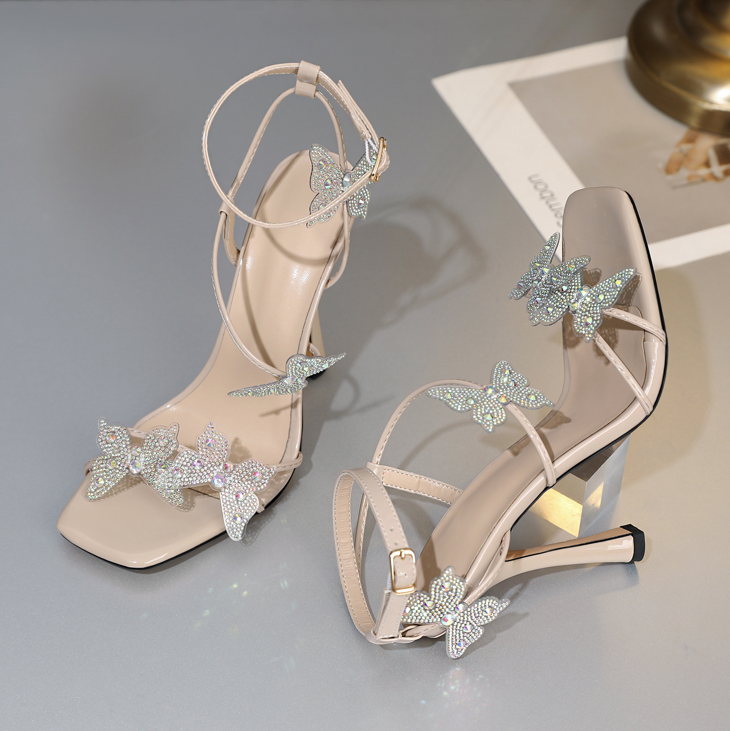 Close-up of rhinestone butterfly on ankle strap – SAMMITOP heels