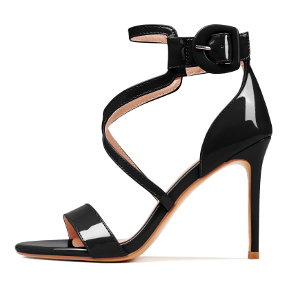 Side view of black cross strap stiletto sandal showing 4-inch heel height

