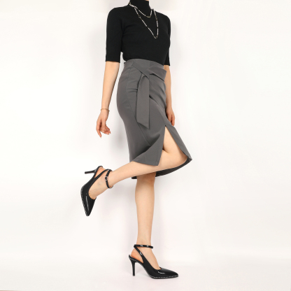 Front view of slingback pumps with ankle strap worn by model