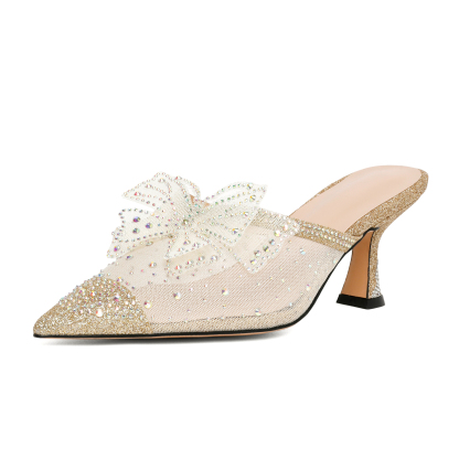 Gold slingback stiletto heels close-up of mesh texture