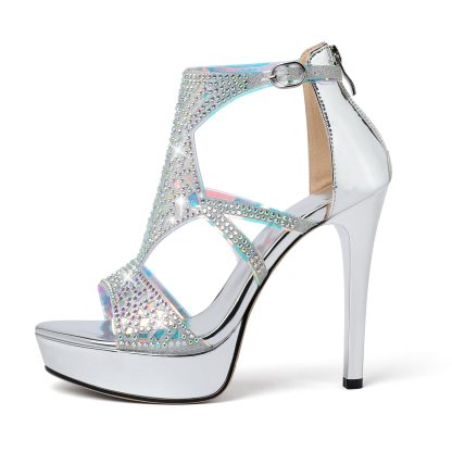 Macro shot of silver heel’s cutout strap and ankle detail