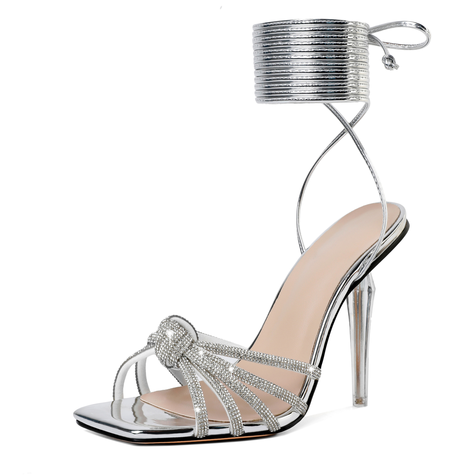 	“Close‑up of silver clear heel and square toe detail”