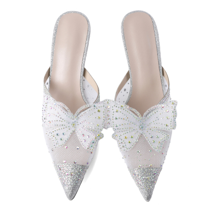 Silver sparkly mesh sandals close-up of bow