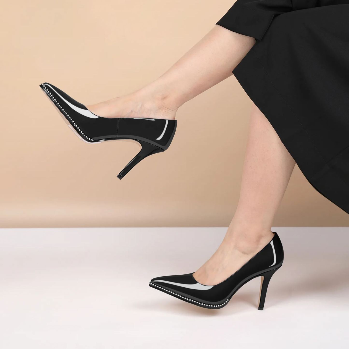 Model wearing wine red beaded stilettos with evening dress