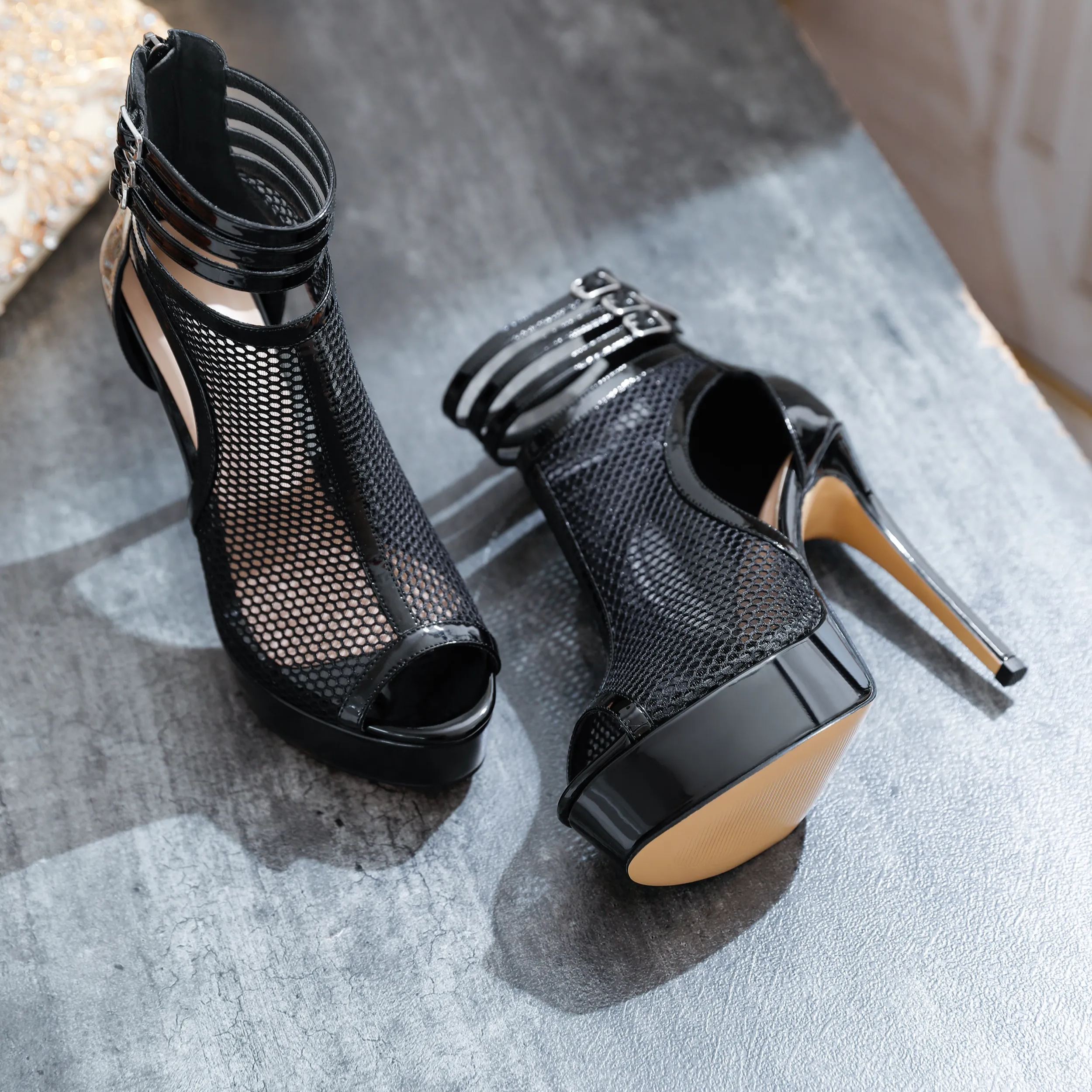 Overhead angle focusing on the peep toe and ankle opening