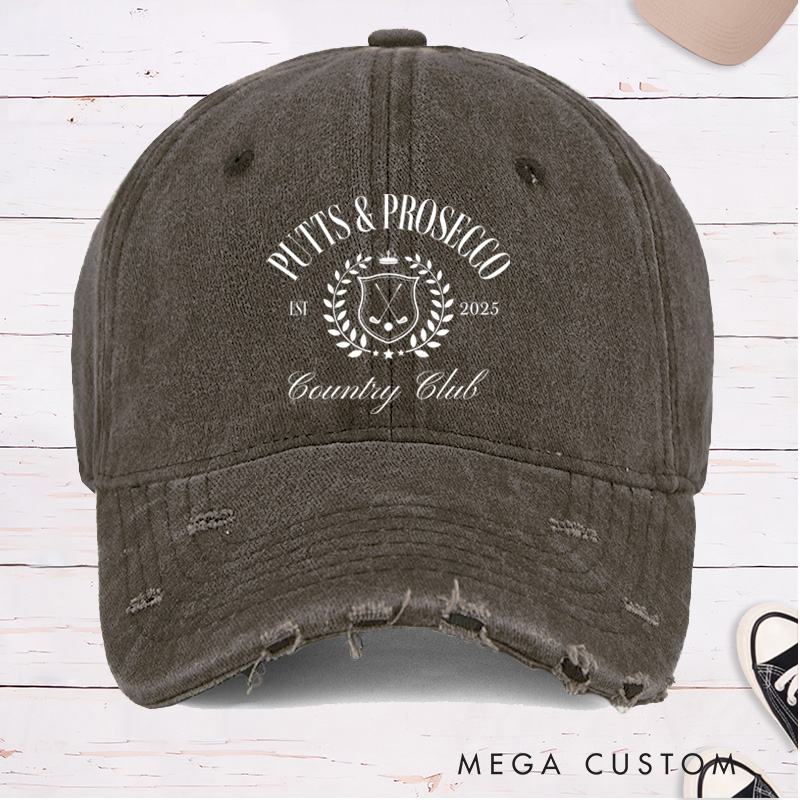 Personalized Distressed Denim Baseball Cap with "Putts & Prosecco" Country Club Laurel Crest Design and Custom EST Year