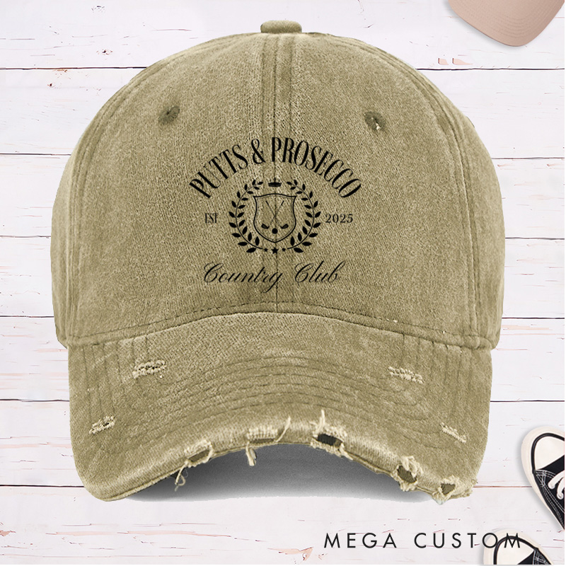 Personalized Distressed Denim Baseball Cap with "Putts & Prosecco" Country Club Laurel Crest Design and Custom EST Year