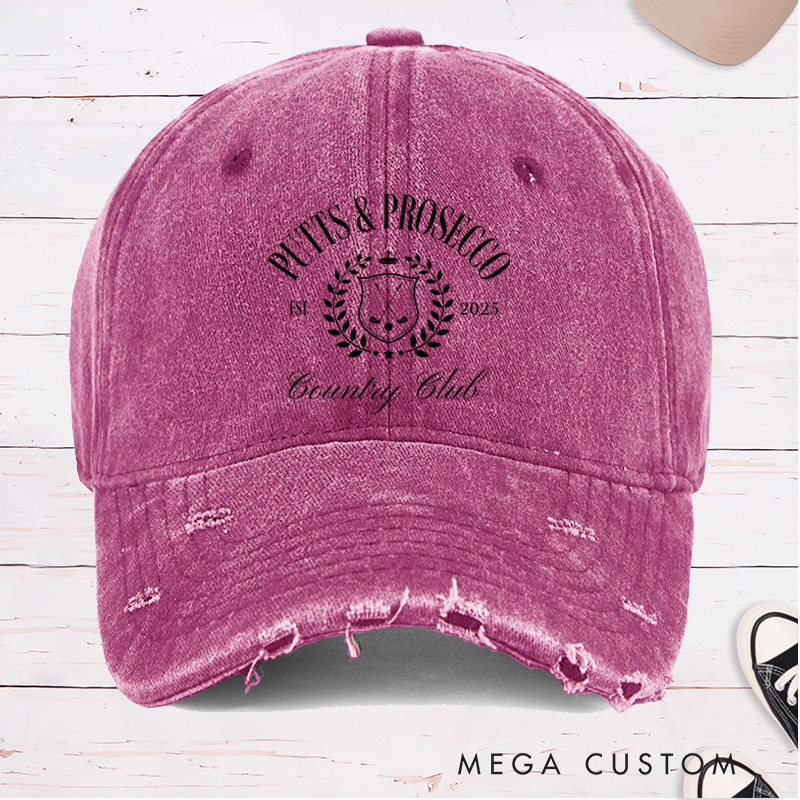 Personalized Distressed Denim Baseball Cap with "Putts & Prosecco" Country Club Laurel Crest Design and Custom EST Year