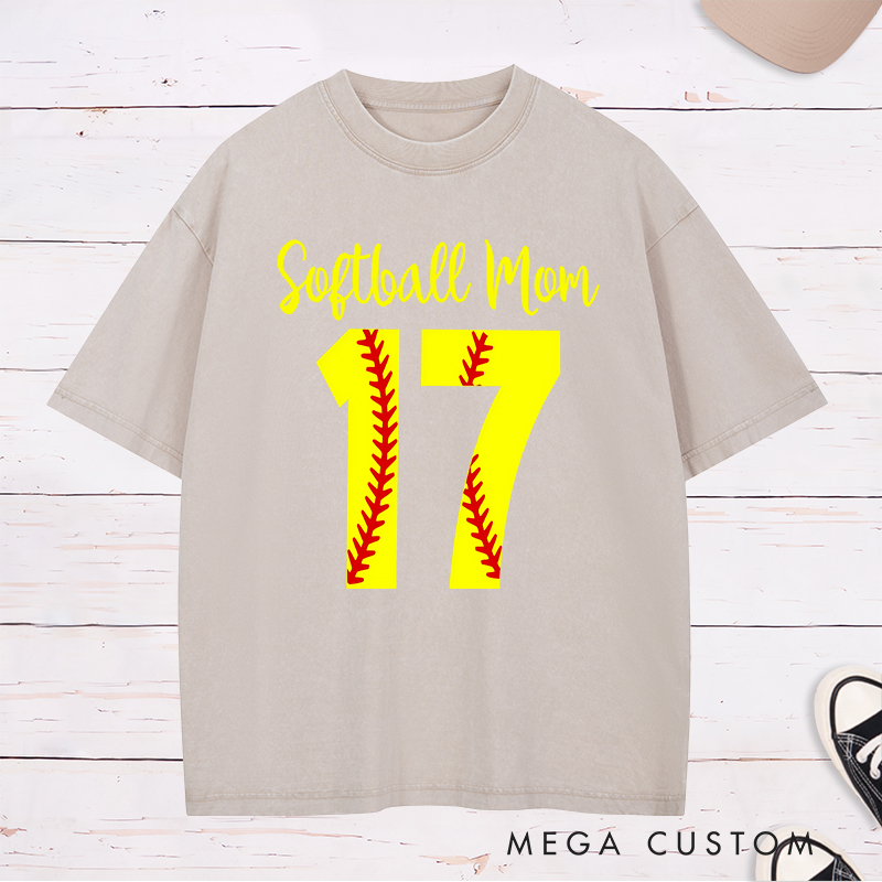 Personalized Softball Mom Washed T-Shirt Design Featuring Customizable Player Number with Red Stitch Softball Pattern and Stylish Yellow Script Text