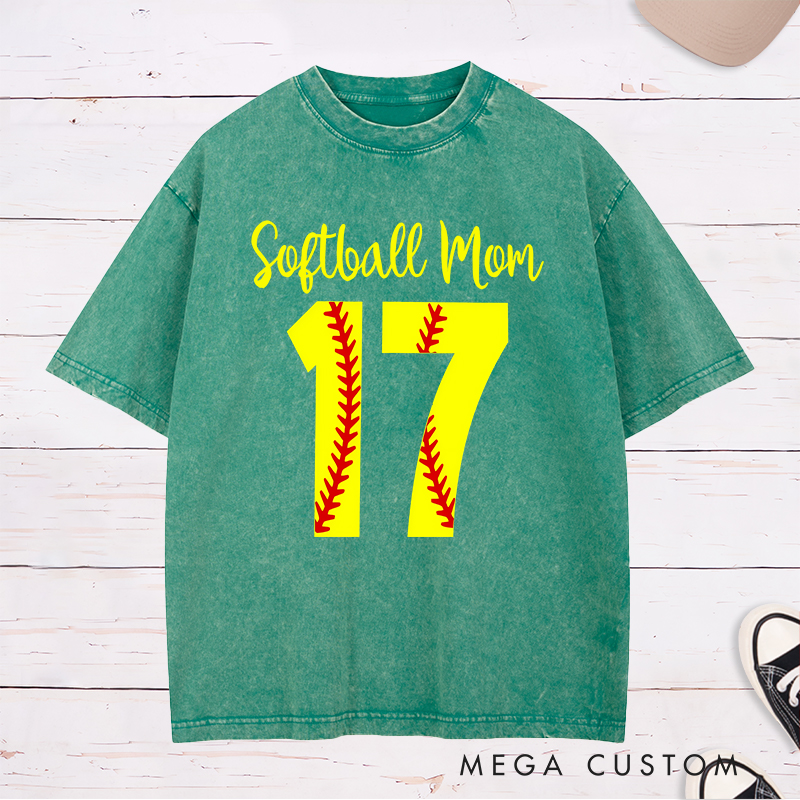 Personalized Softball Mom Washed T-Shirt Design Featuring Customizable Player Number with Red Stitch Softball Pattern and Stylish Yellow Script Text
