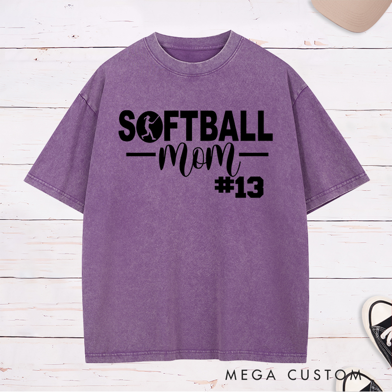 Personalized Softball Mom Washed T-Shirt Design Featuring Bold Text Player Number and a Stylish Softball Silhouette Graphic