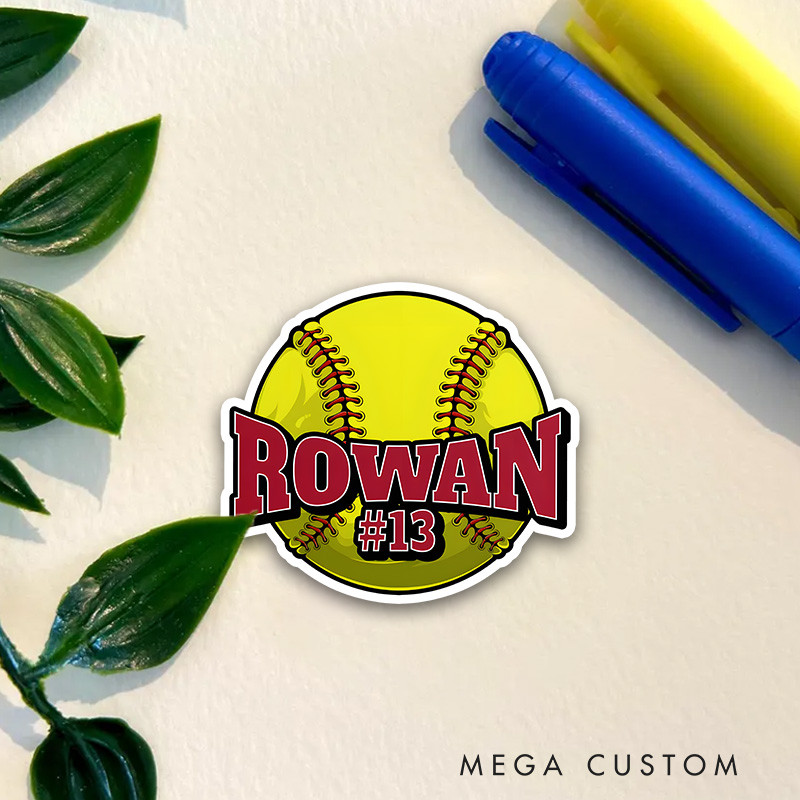 Personalized Softball Decal with Custom Name and Number on a Vibrant Yellow Softball Design Featuring Bold Red Lettering Black Outline and Realistic Stitching