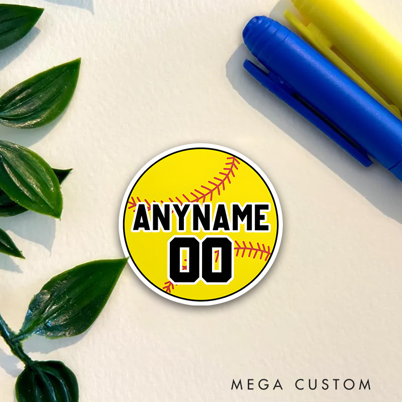 Personalized Softball Decal with Custom Name and Number on a Vibrant Yellow Softball Design Featuring Bold Black and White Block Lettering Realistic Red Stitching and a Clean Circular Layout