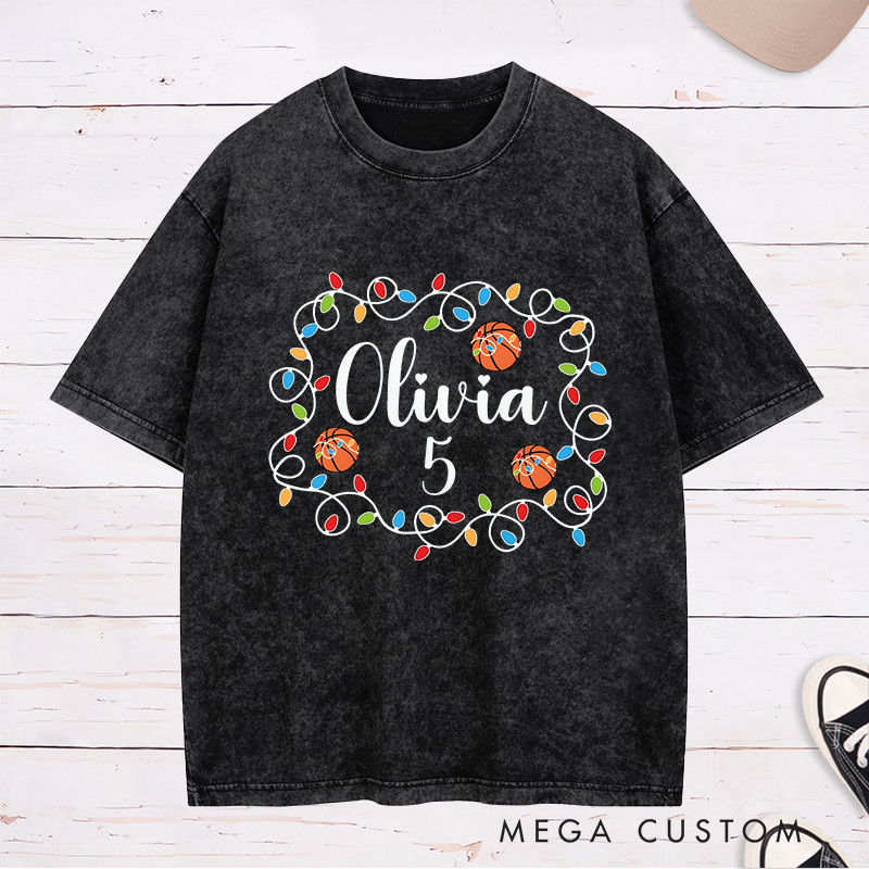 Personalized Washed Christmas T-Shirt with Custom Name, Number, Basketballs, and String Lights Design