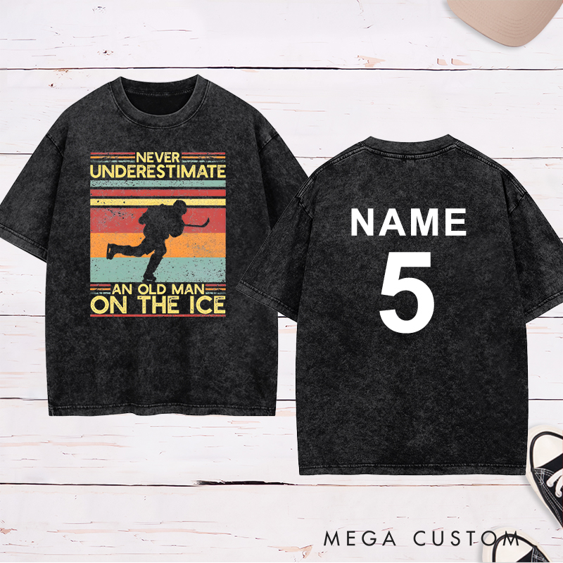 Personalized "Never Underestimate an Old Man on the Ice" Hockey Washed T-Shirt with Custom Name and Number