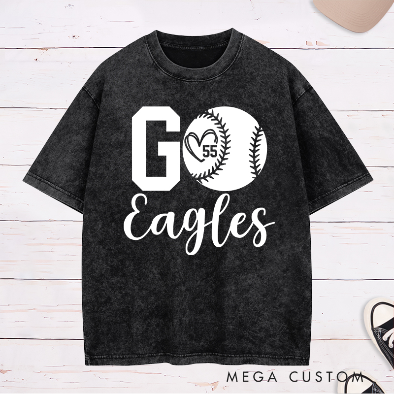 Personalized Softball Spirit Washed T-Shirt Design Featuring Bold "Go" Text Team Name in Elegant Script Heart-Shaped Player Number Inside a Softball Graphic Perfect for Fans and Players
