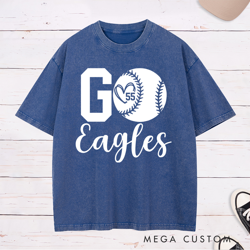 Personalized Softball Spirit Washed T-Shirt Design Featuring Bold "Go" Text Team Name in Elegant Script Heart-Shaped Player Number Inside a Softball Graphic Perfect for Fans and Players