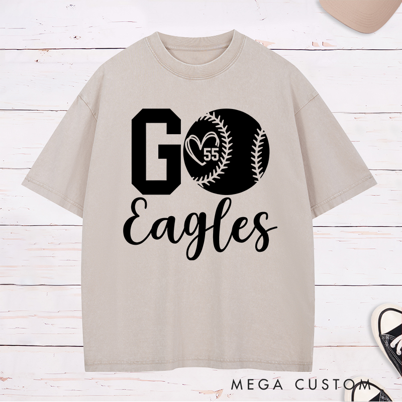 Personalized Softball Spirit Washed T-Shirt Design Featuring Bold "Go" Text Team Name in Elegant Script Heart-Shaped Player Number Inside a Softball Graphic Perfect for Fans and Players