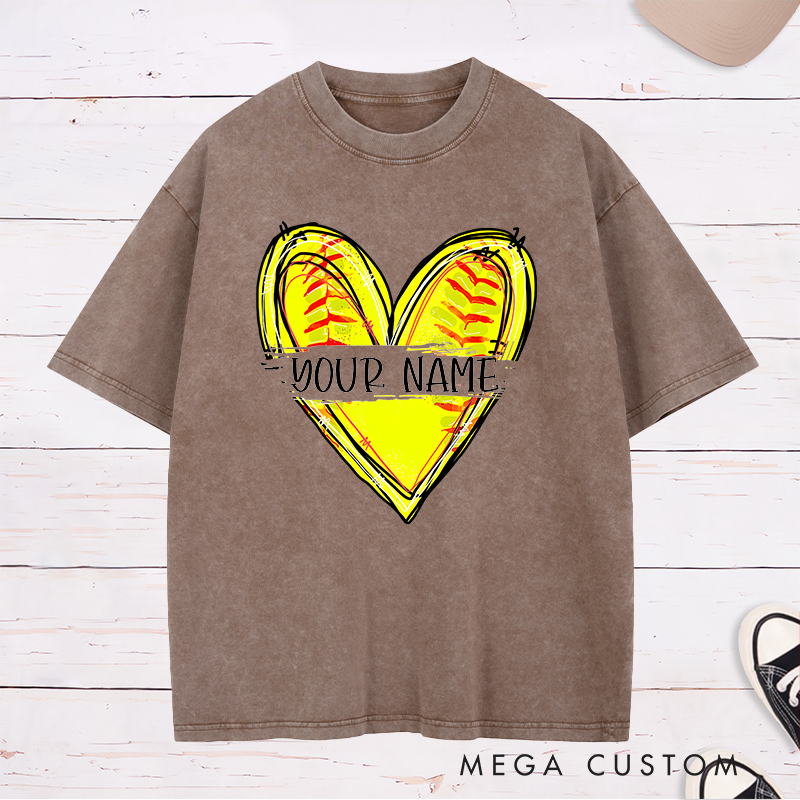 Personalized Softball Heart Washed T-Shirt Design Featuring Customizable Name with Bright Yellow Softball Stitching Graphic